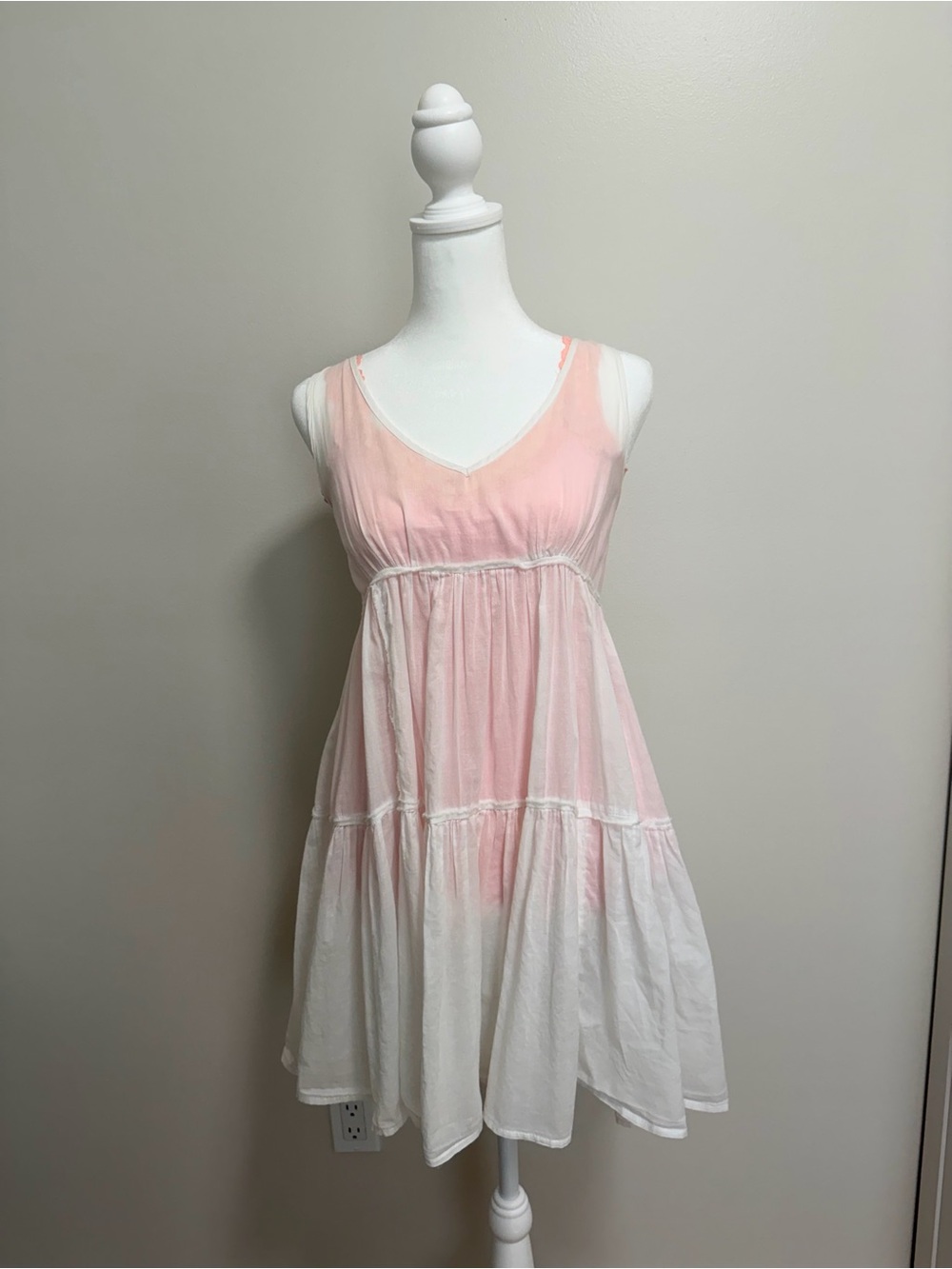 Cute see through summer dress with two tank tops. Very cute over leggings.
